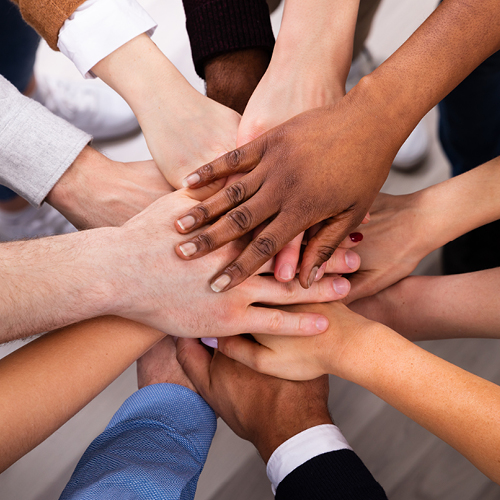 Image of a female dentist in a dentist's office, using a tablet, symbolizing HuFriedyGroup's DE&I Subcommittee's commitment to promoting diversity, fostering an inclusive culture, and ensuring equity in the workplace.